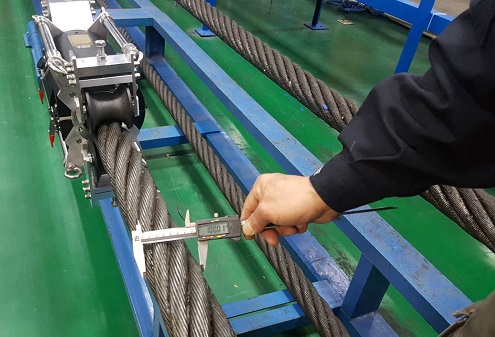 Sistema de monitoreo automático en línea de banda tranportadora con nucléo de cables de acero