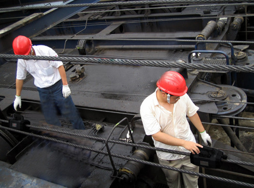 Sistema de monitoreo automático en línea de banda tranportadora con nucléo de cables de acero